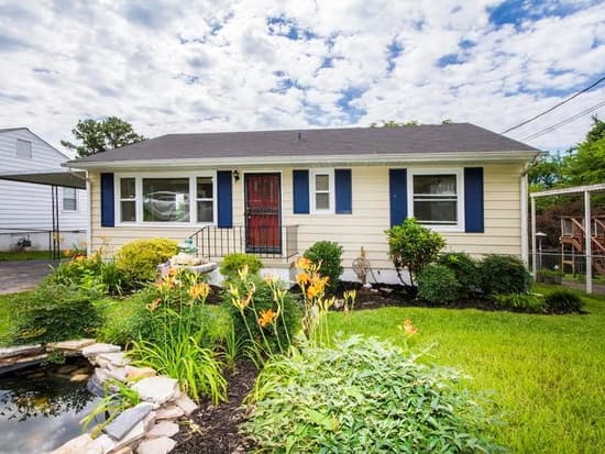 Completed single-story home exterior with refreshed landscaping