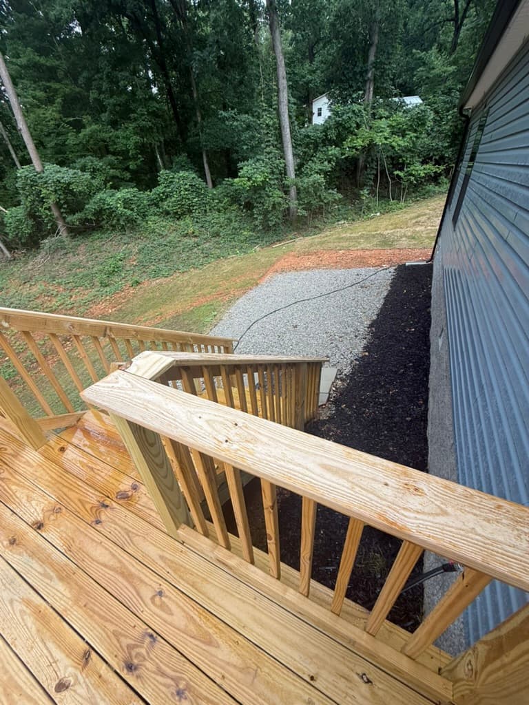 Side exterior view showing completed site and home access