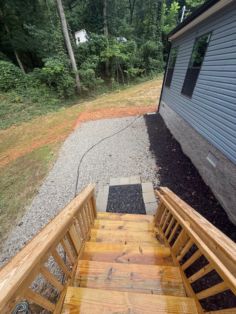 Lower landing and stair system viewed from the deck